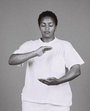 Dr. Med Isabel Selassie demonstrating breast cancer exercises